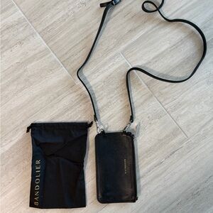 Bandolier Black Leather pouch with strap and dust cover
